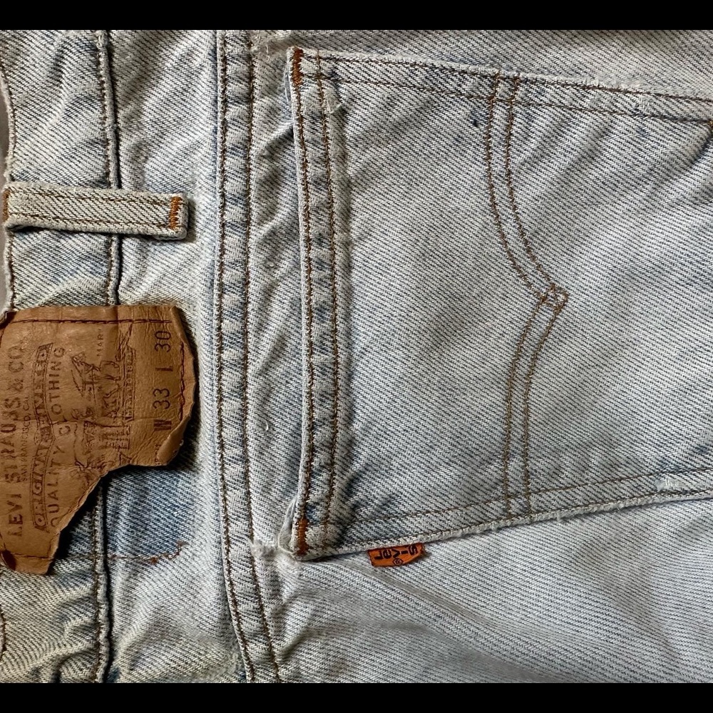 Orange tags Levi’s